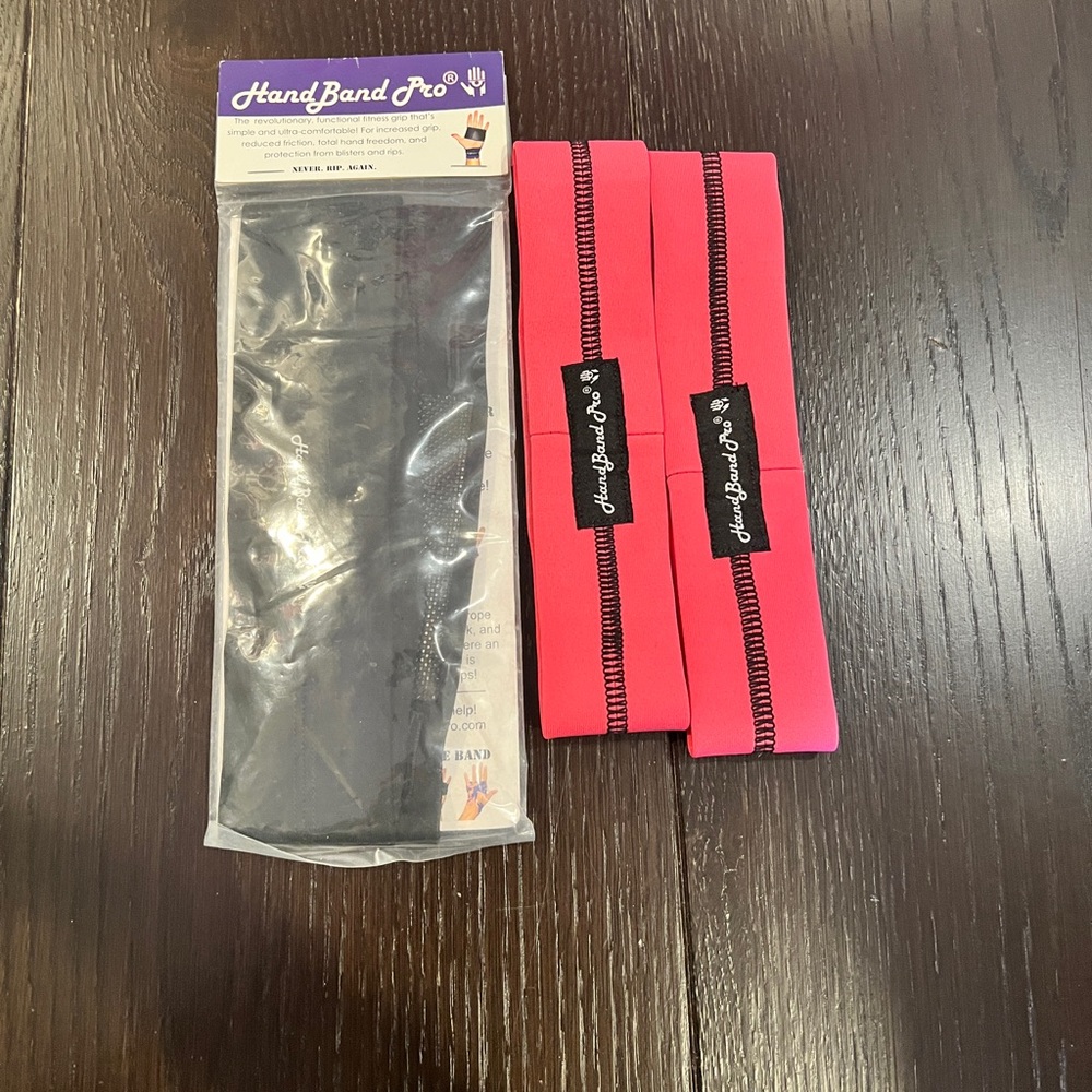 Lot of 2 Hand Band Pro Black and Pink *NEW & EUC* MSRP: $60+tax